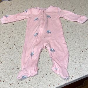 Pink Disney baby footed sleep n' play coverall.